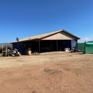 PARCELA DE AGRADO SECTOR CAVILOLEN CON TRES CONTAINERS Y GALPÓN
